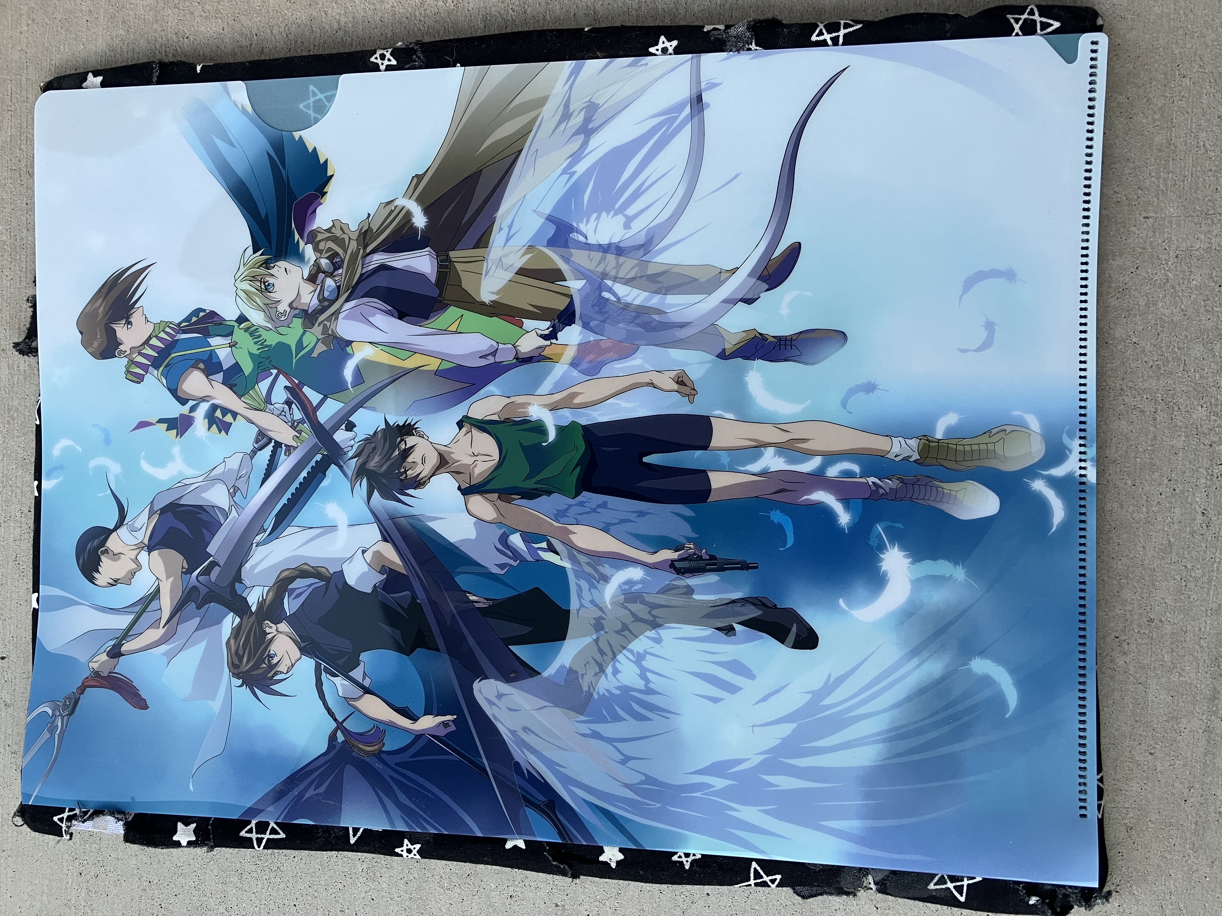 Front of clear file with the main Gundam wing group either wearing or holding symbols of their gundams .