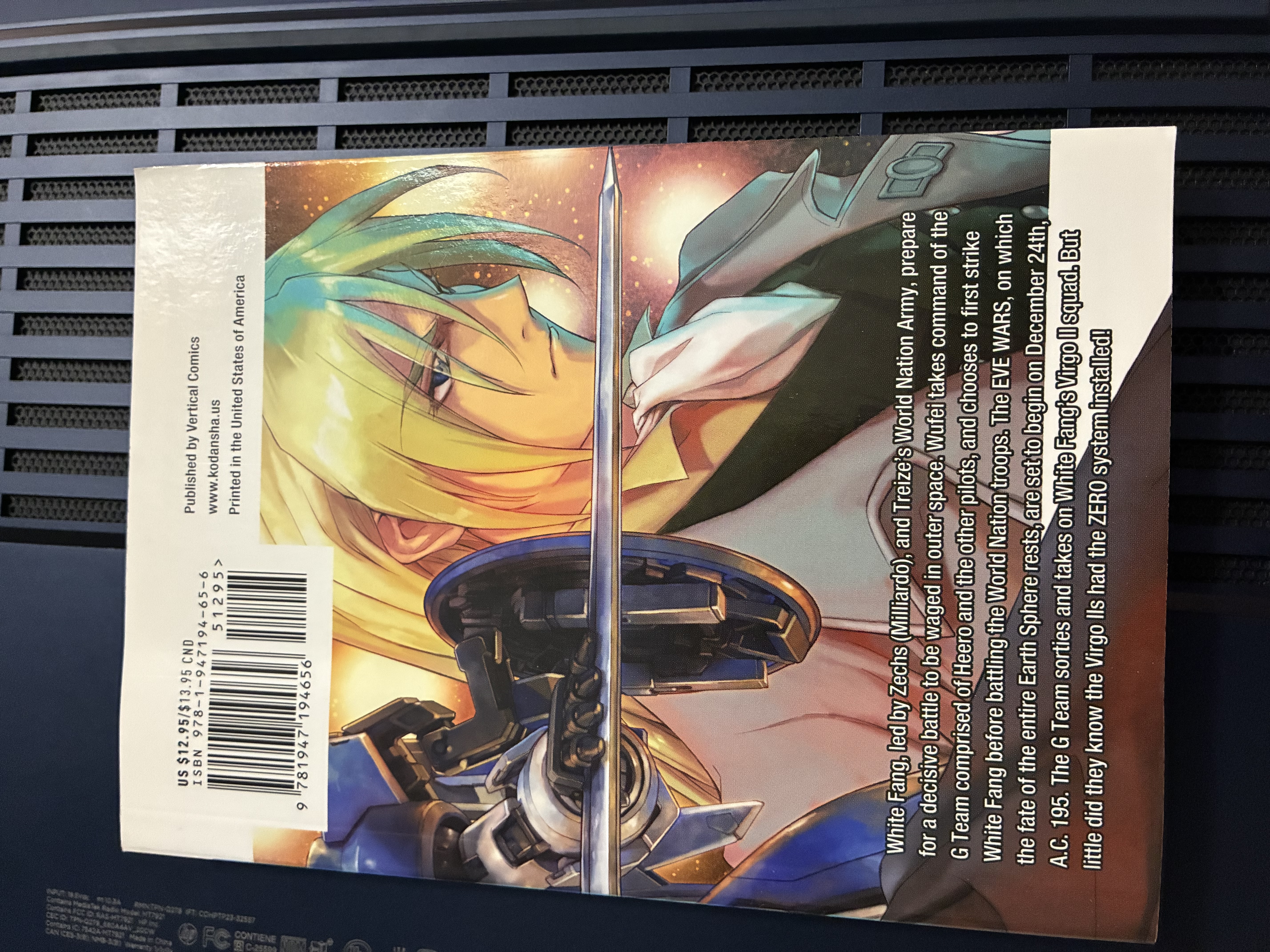 Back of Gundam Wing Endless Waltz: Glory of the Losers Volume 13 with the back showing Tallgeese II sword and Zechs.