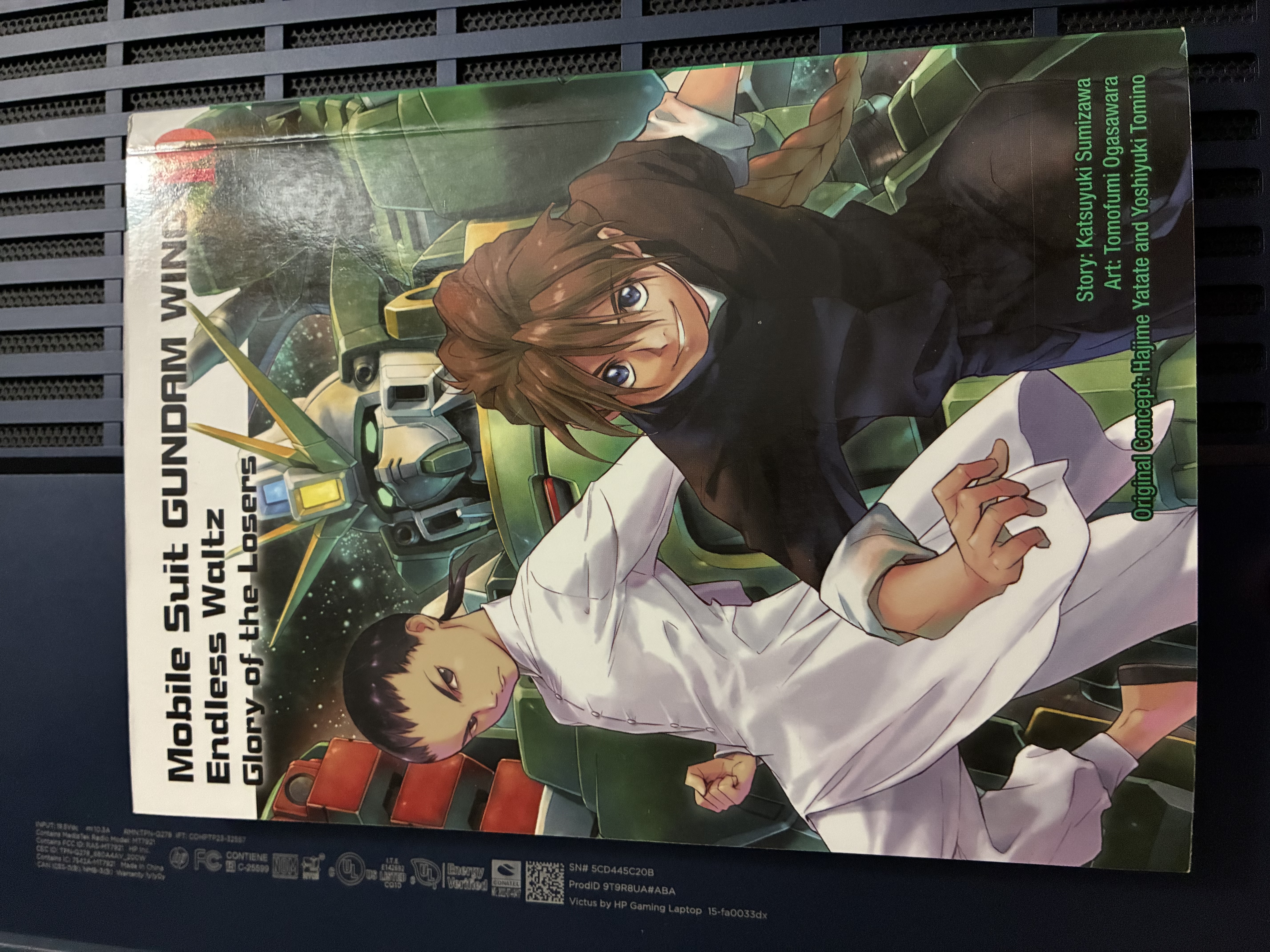 Front of Gundam Wing Endless Waltz: Glory of the Losers Volume 10 with the cover showing Duo and Wufei posing and Altron in the background.