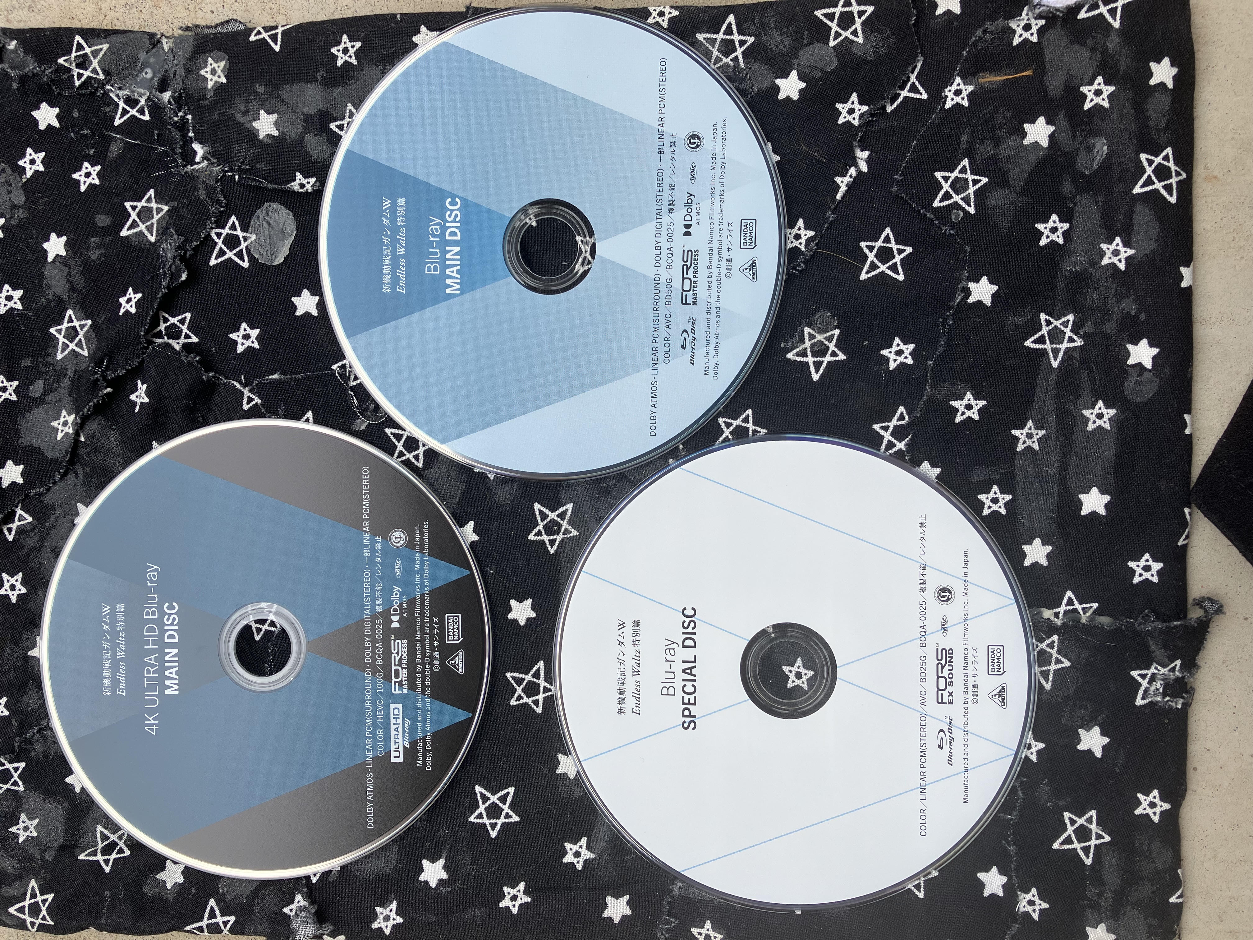 Blu ray discs of Gundam wing endless waltz and its special features.