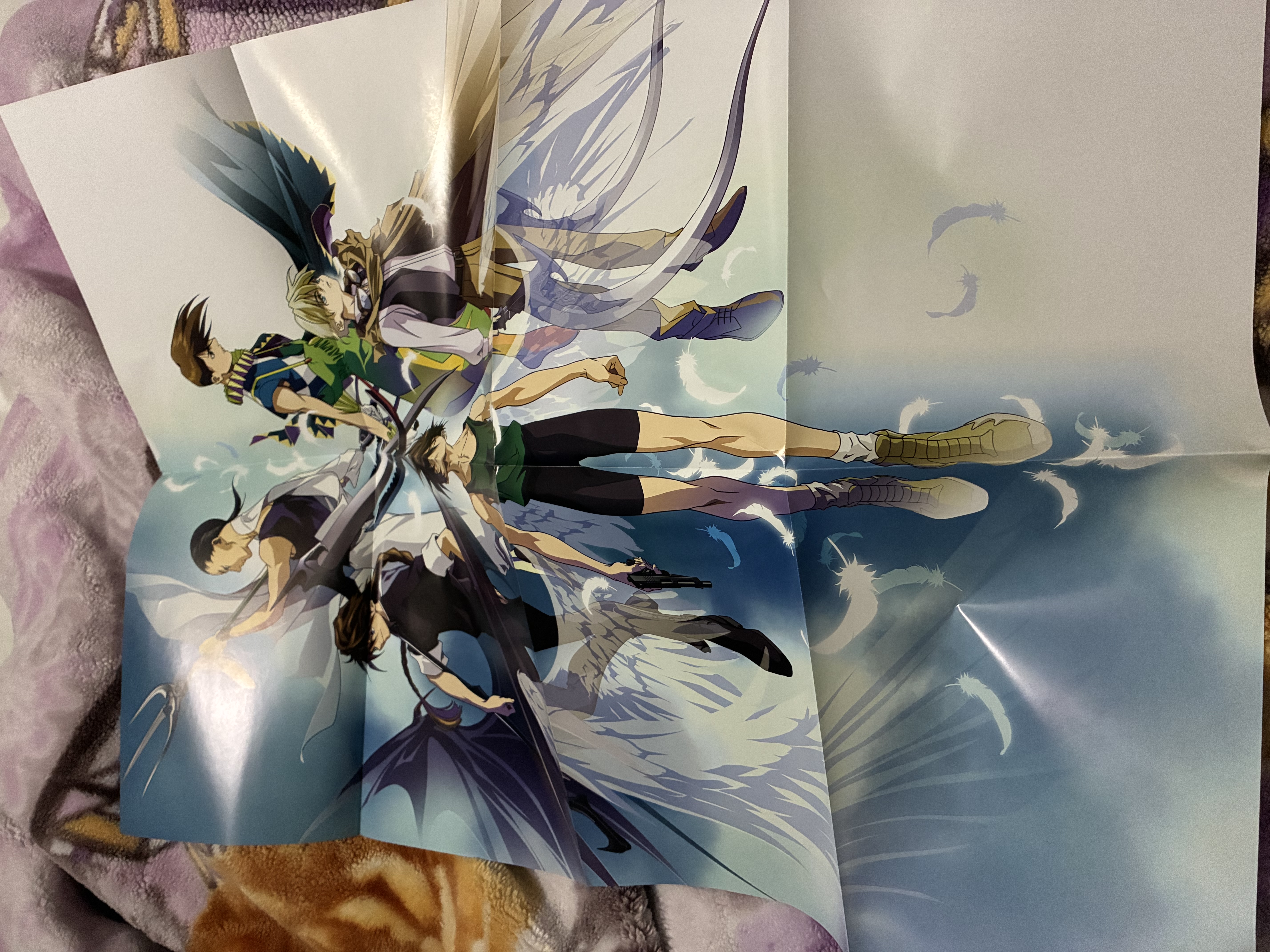 Poster of the main Gundam wing group either wearing or holding symbols of their gundams.
