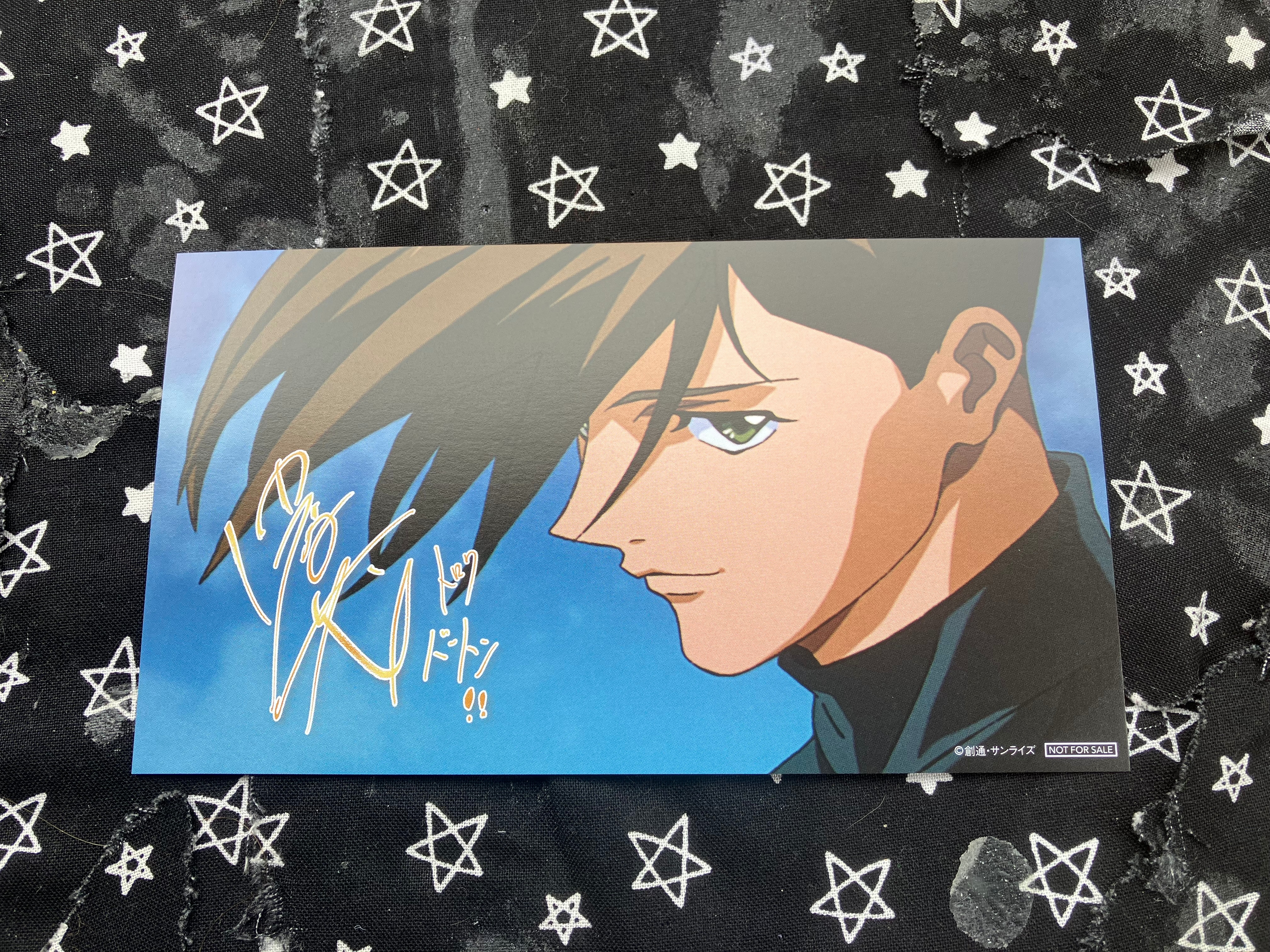 Illustration card of Gundam wing Trowa that has a reproduction signature of Shigeru Nakahara on it.