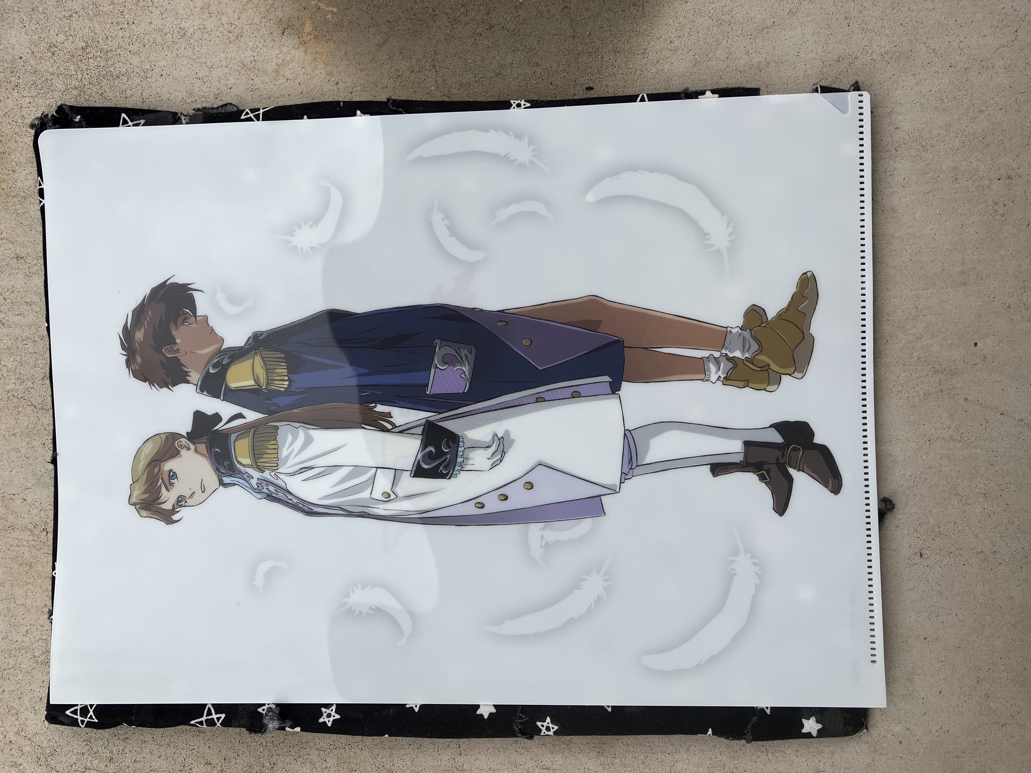 Front of clear file with Gundam wing Relena and Heero in their Sanc kingdom jackets.