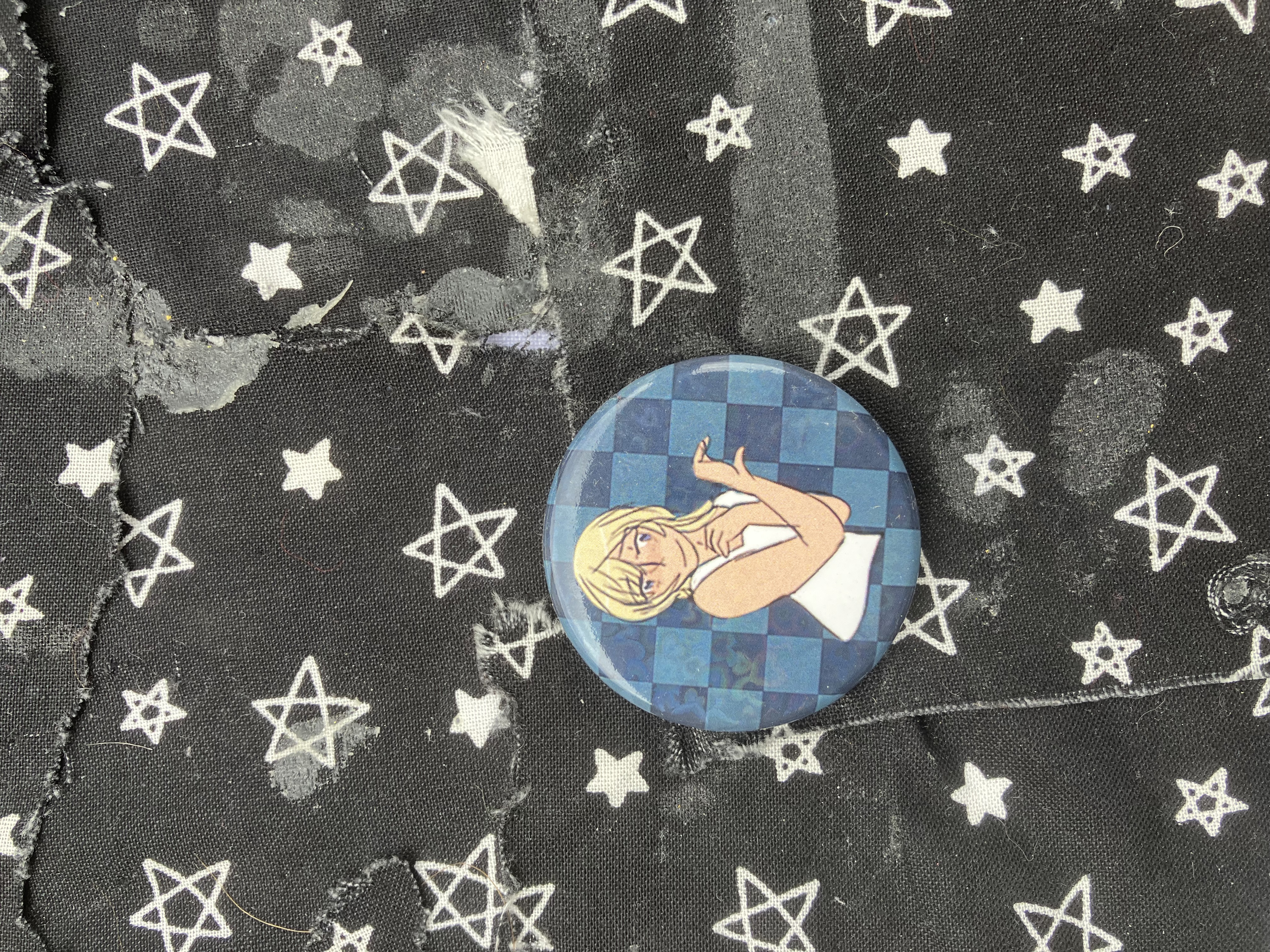 Button of Kingdom hearts Namine making a heart sign with her hand.