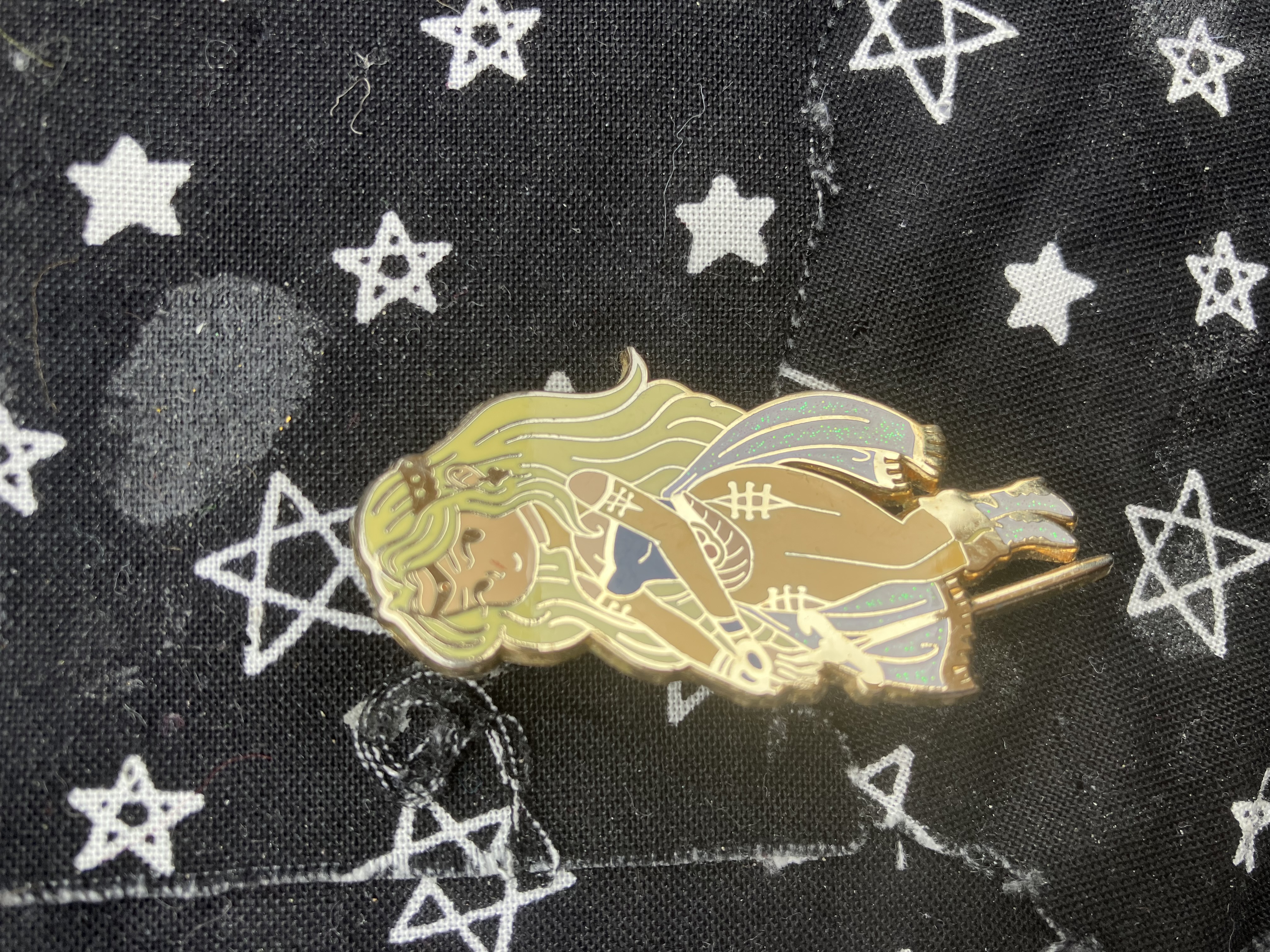 Enamel pin of Final fantasy 6 Celes holding her sword.