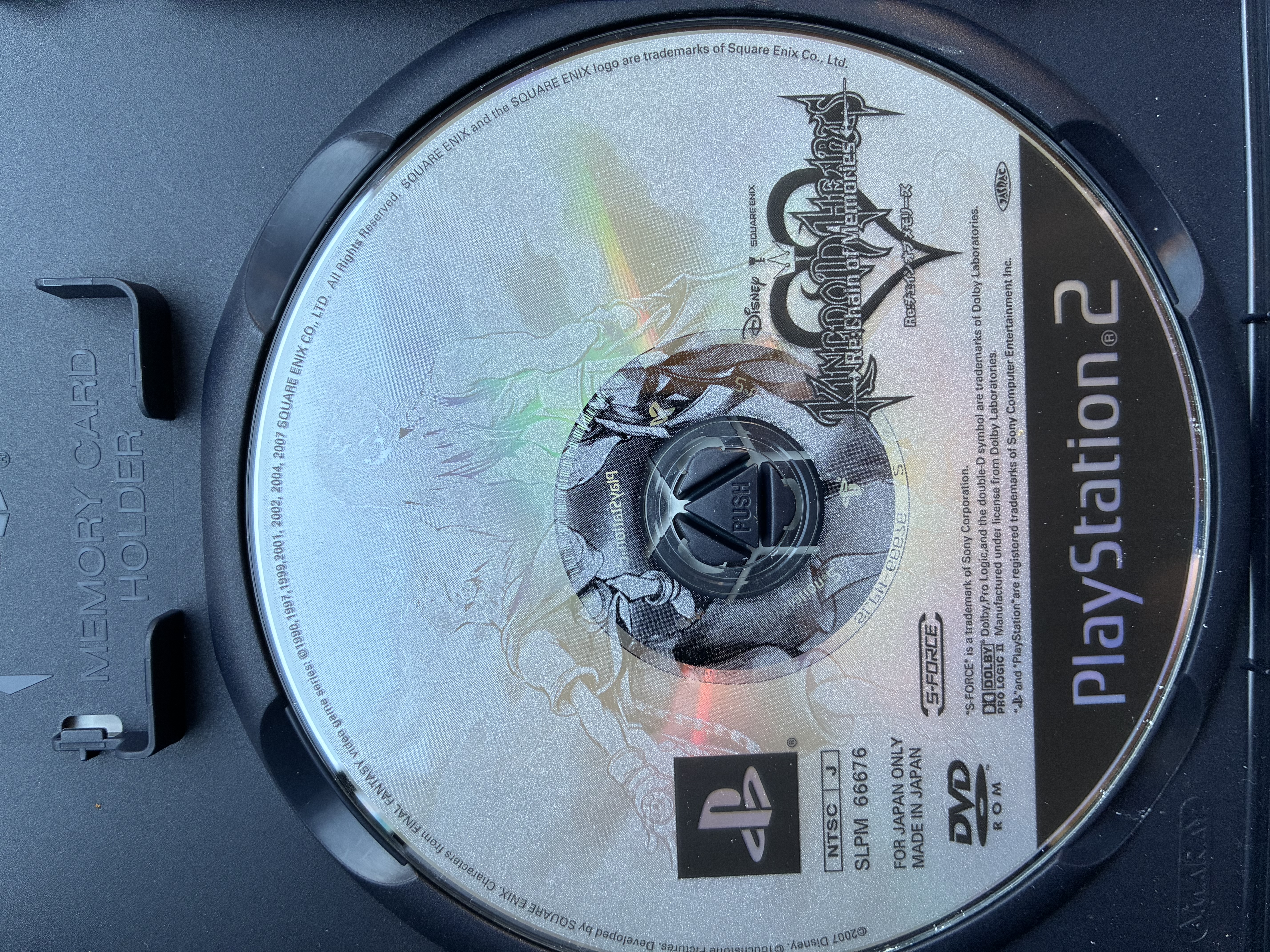 Disc of Kingdom hearts chain of memories in a disc tray.