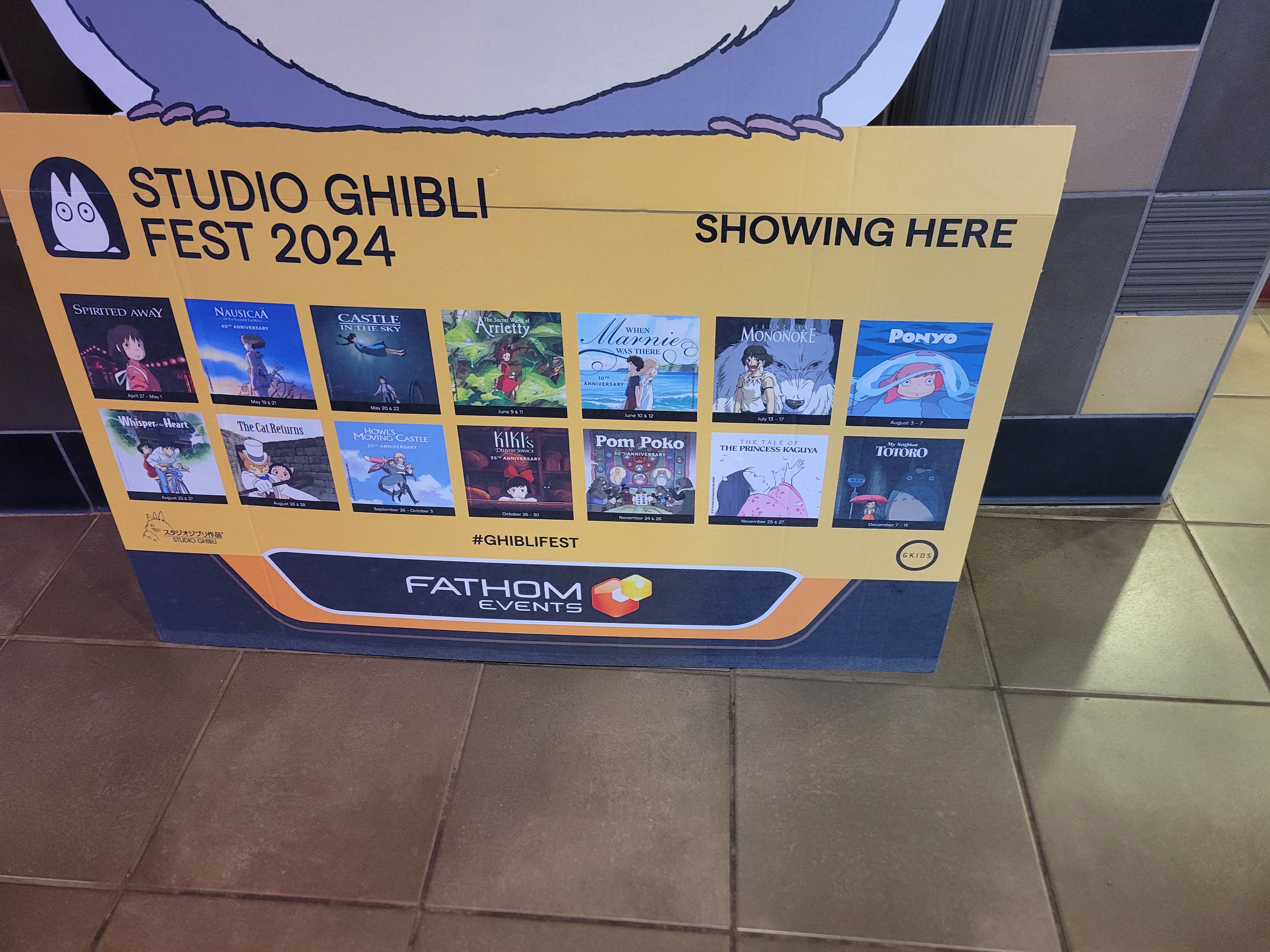 Cardboard stand of listing each Ghibli movies playing for the festival.