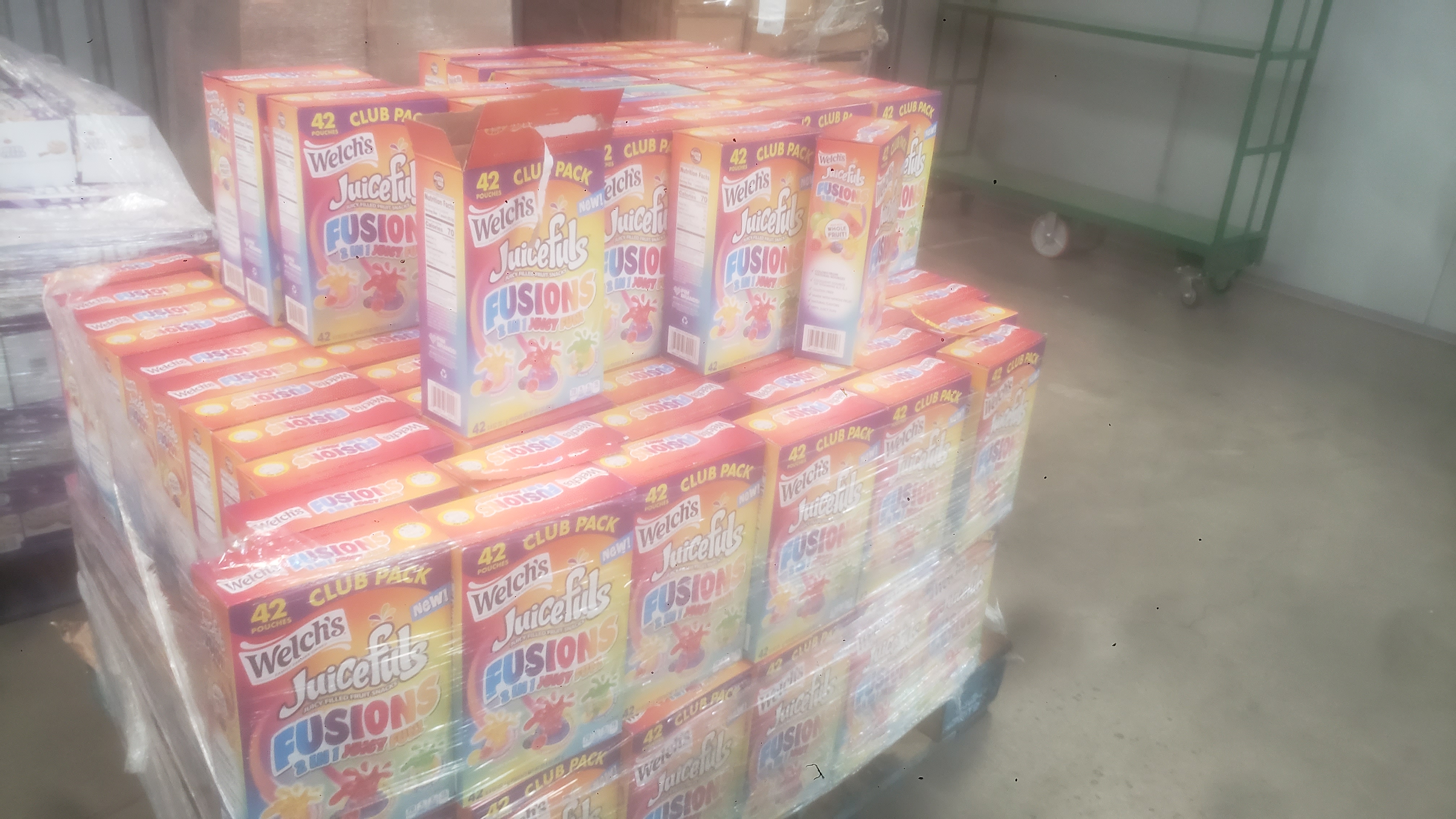 Boxes of fruit snacks on a pallet.