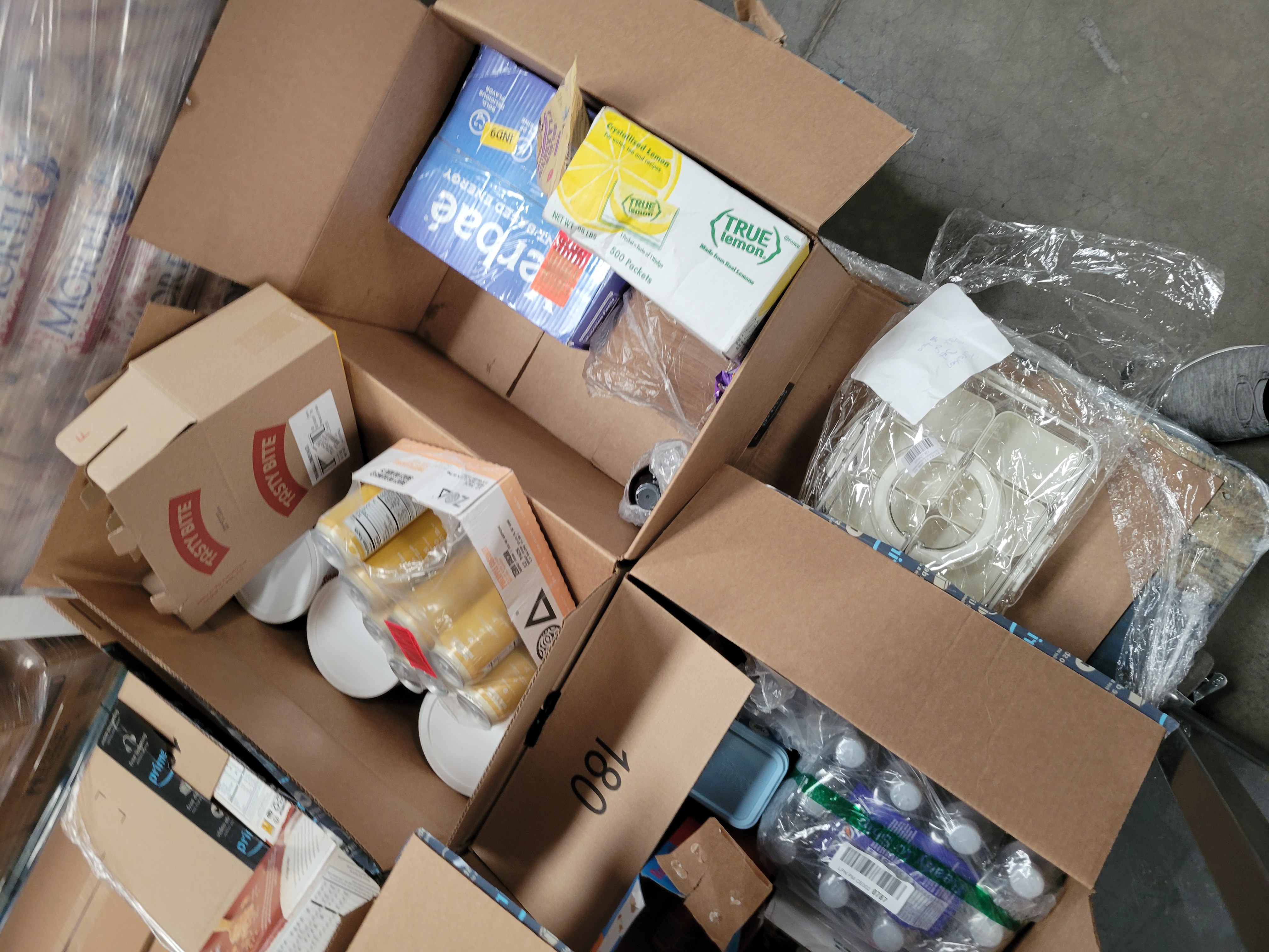 Cardboard boxes of food.