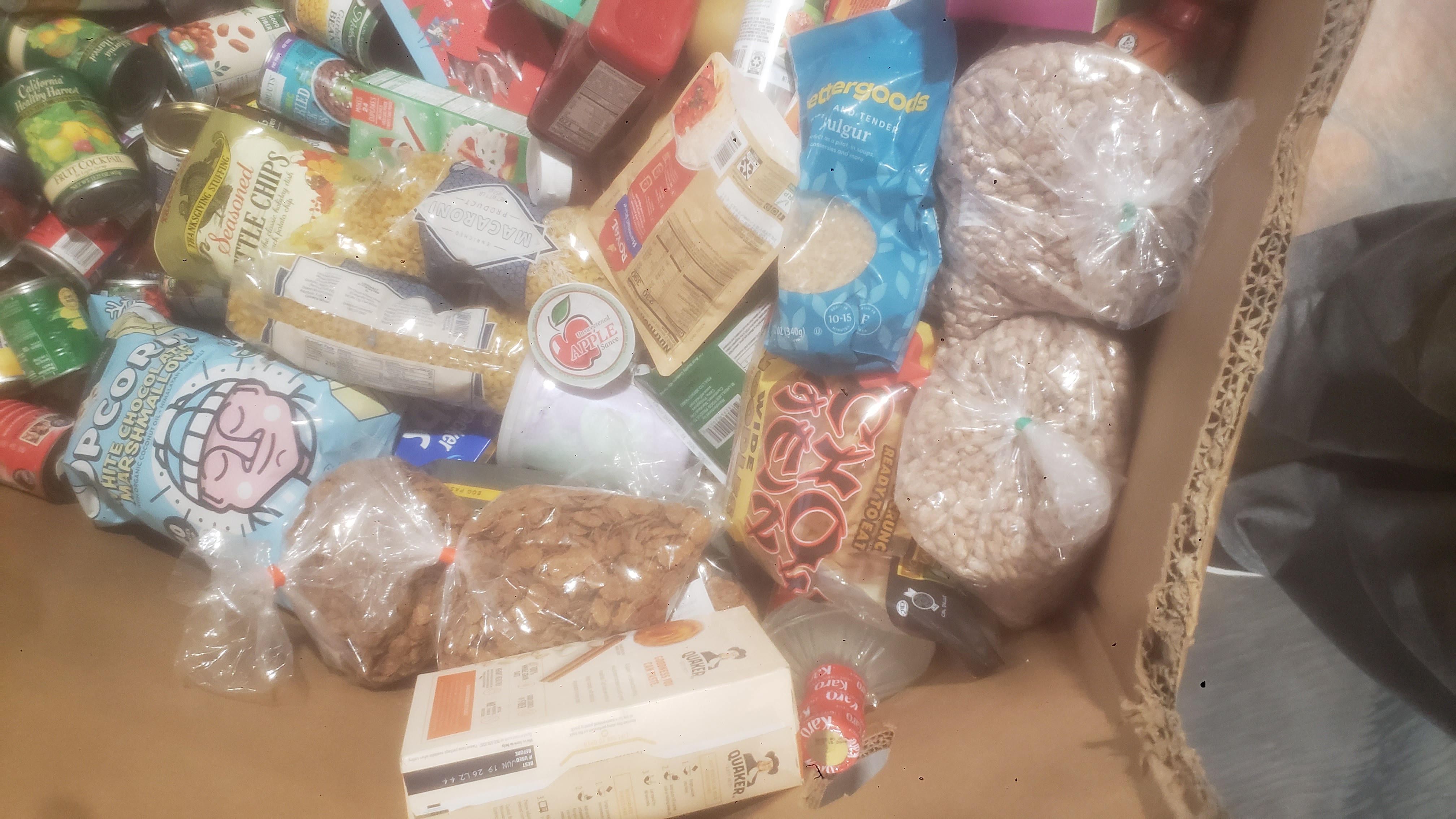 Cardboard container of food.
