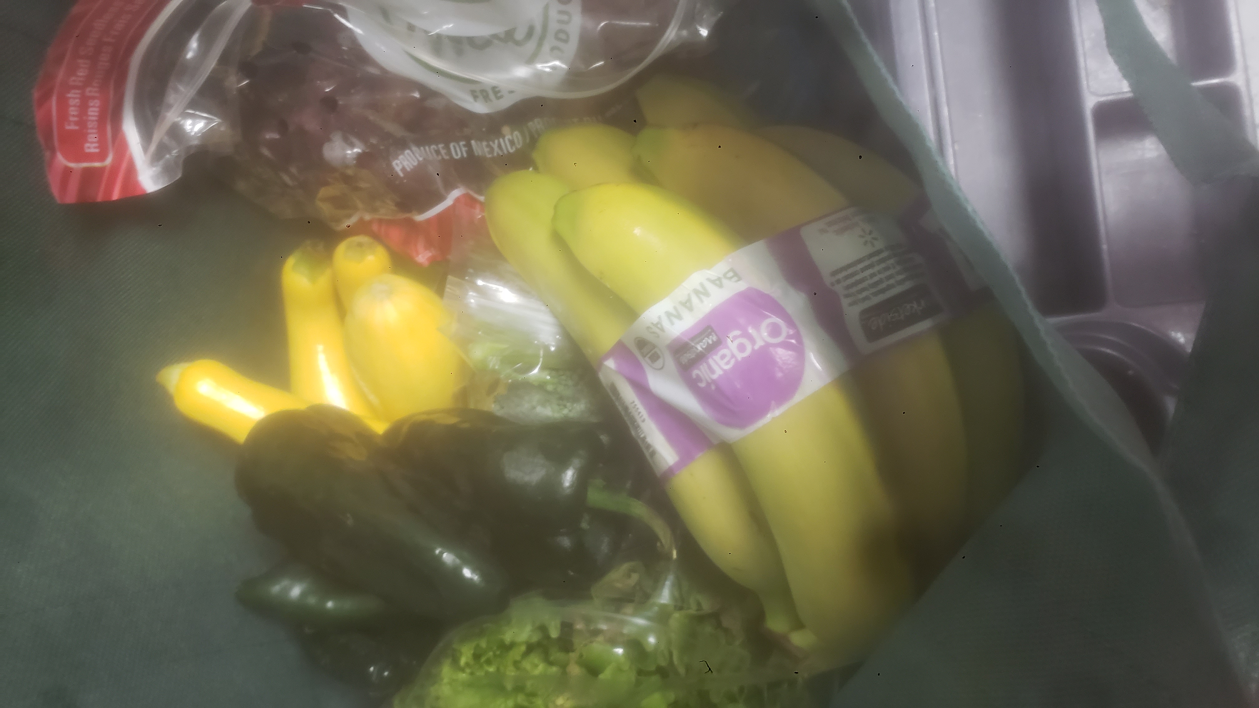 Various produce in a tote bag.