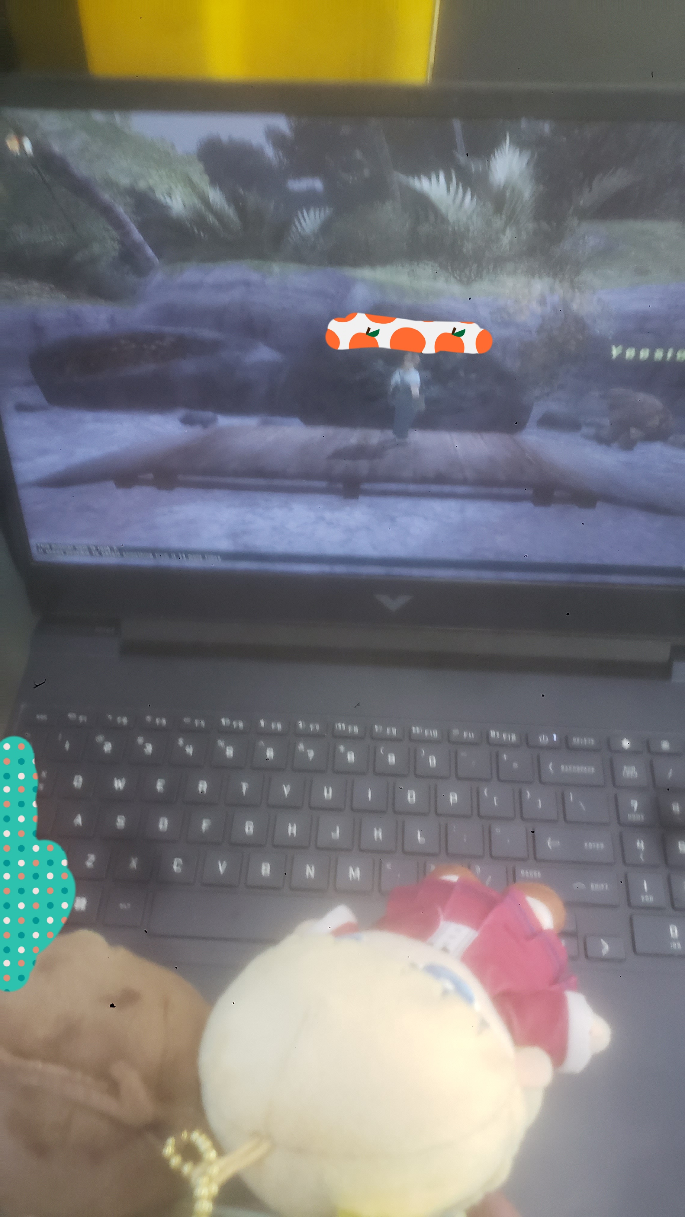 Laptop playing final fantasy xi with player character mining in the mog garden with Gundam Wing Relena and Heero plush in frame.