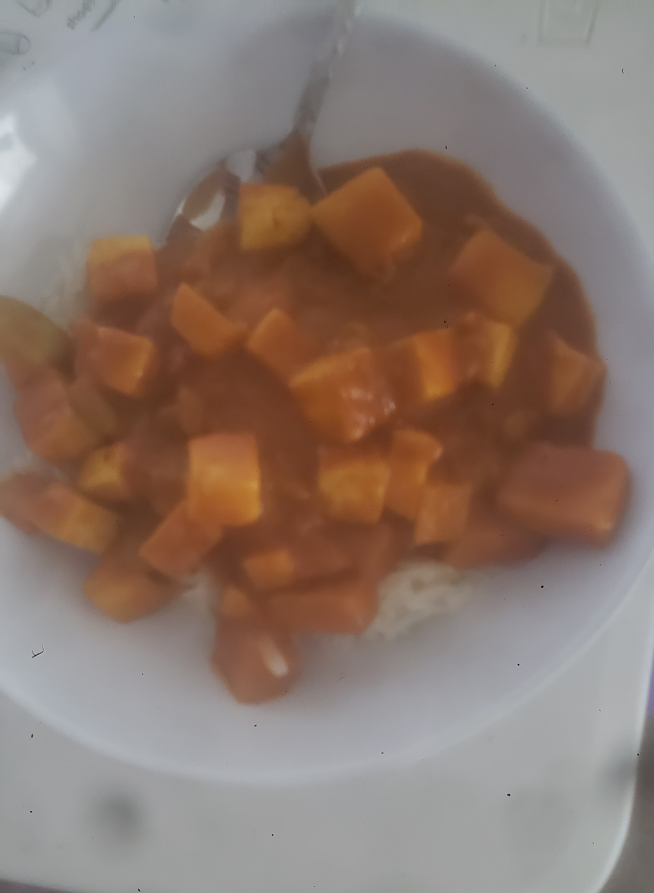 Curry with paneer in a bowl.
