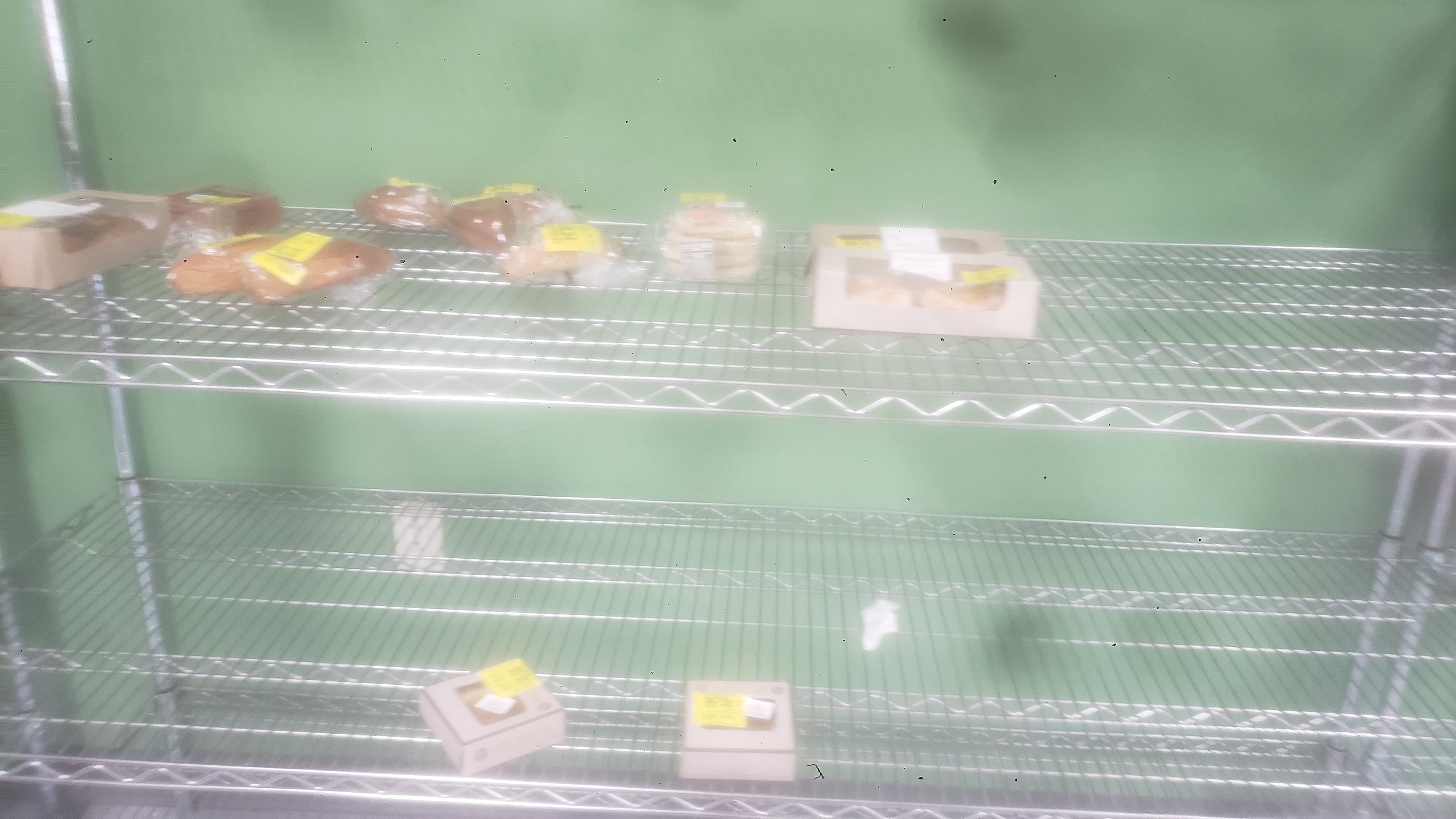 Random pastries on a shelf.