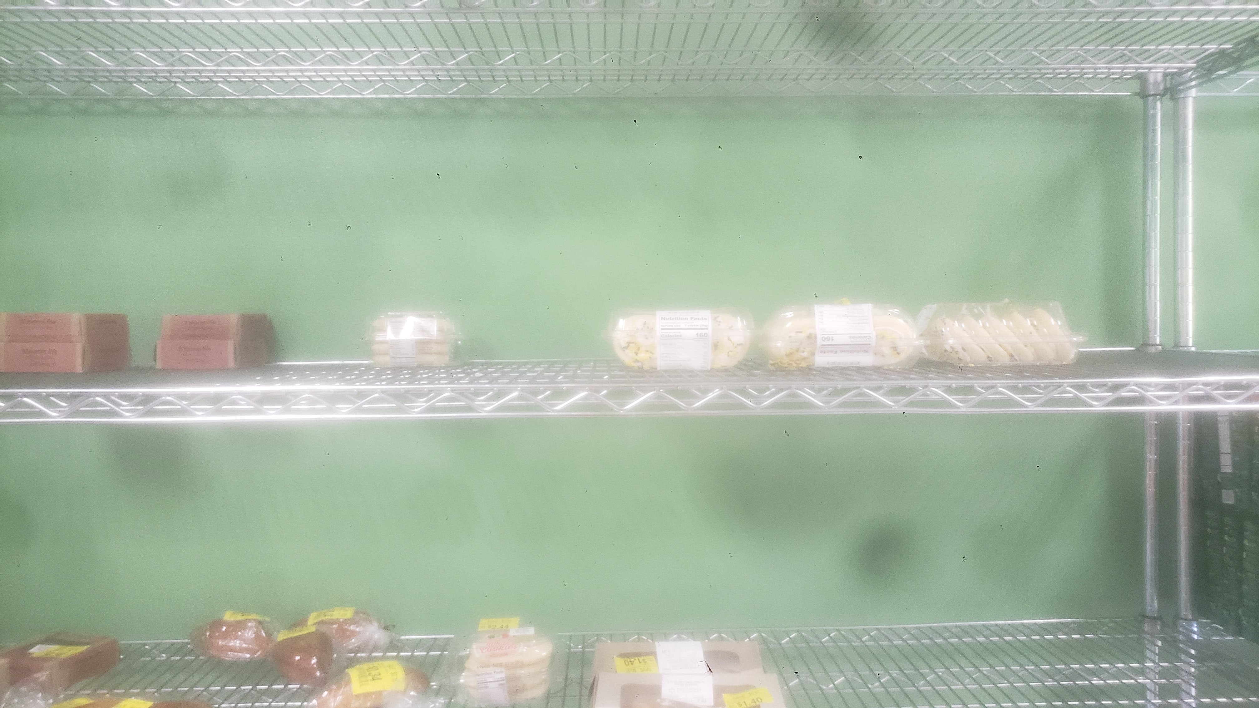 Random pastries on a shelf.
