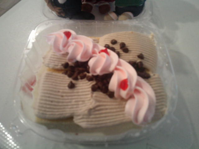 Tres leches cake in a to go container.
