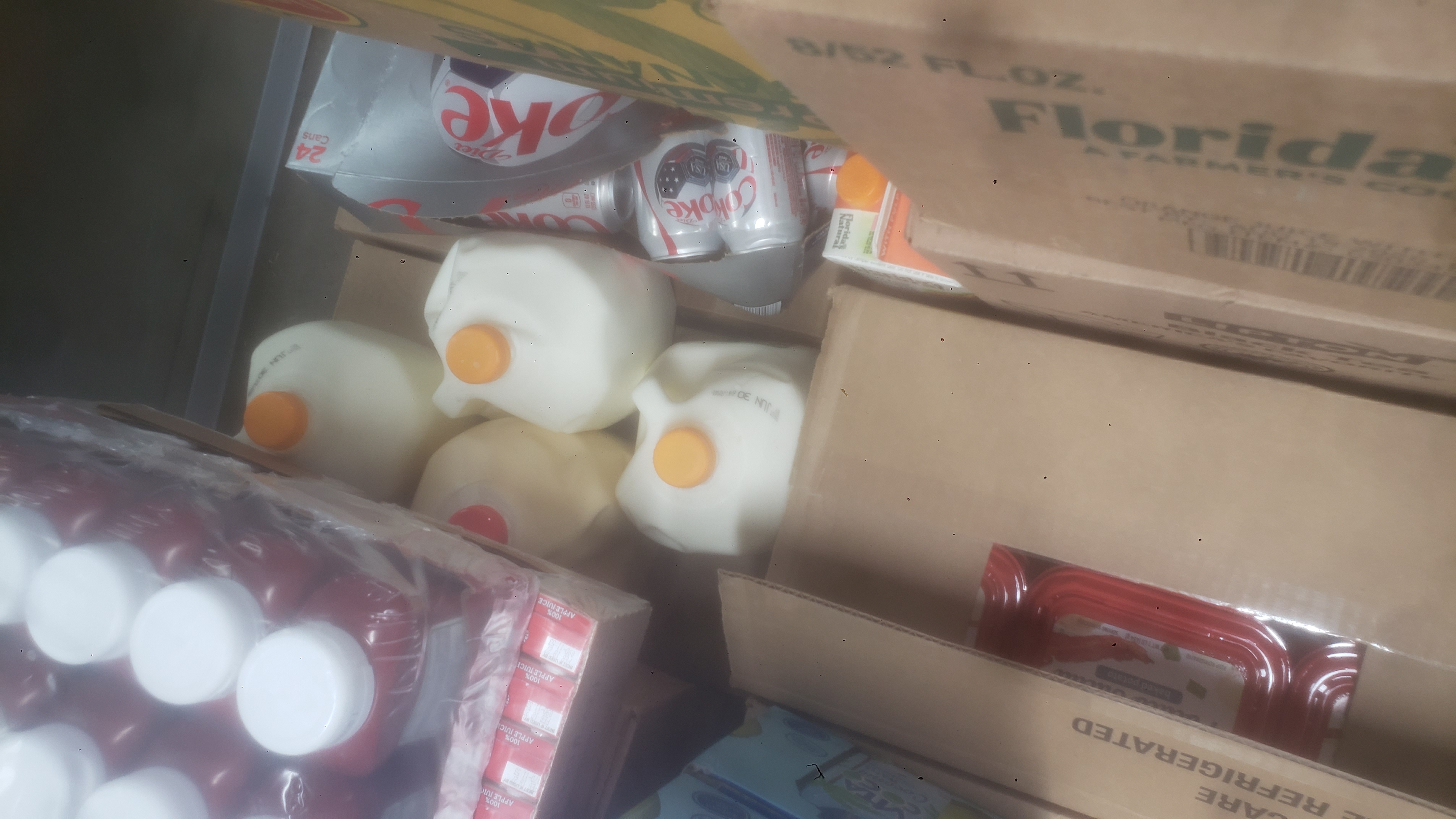 Miscellaneous goods on pallets side by side.