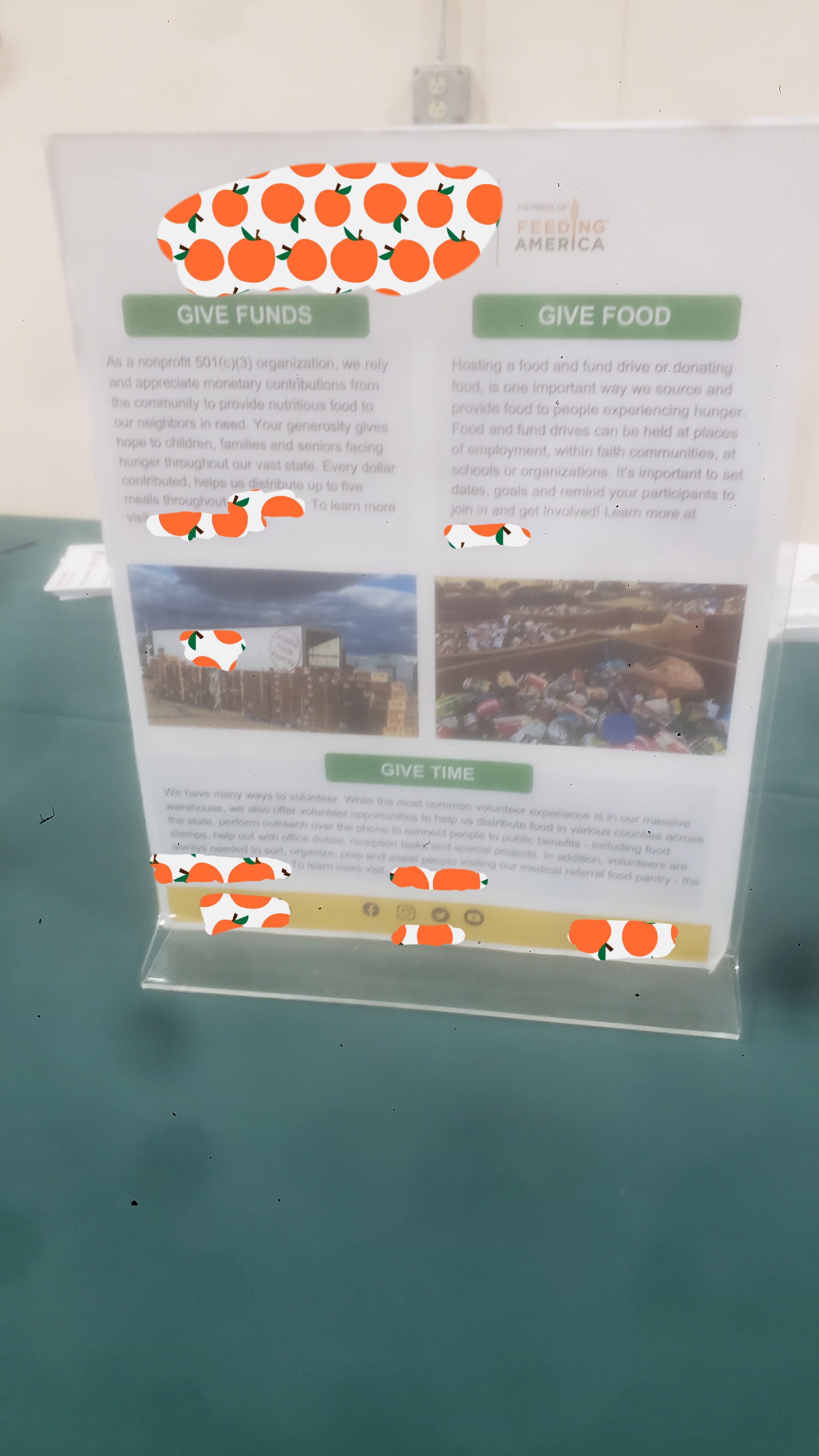 A sign about giving funds, giving time, or giving food to a food bank.