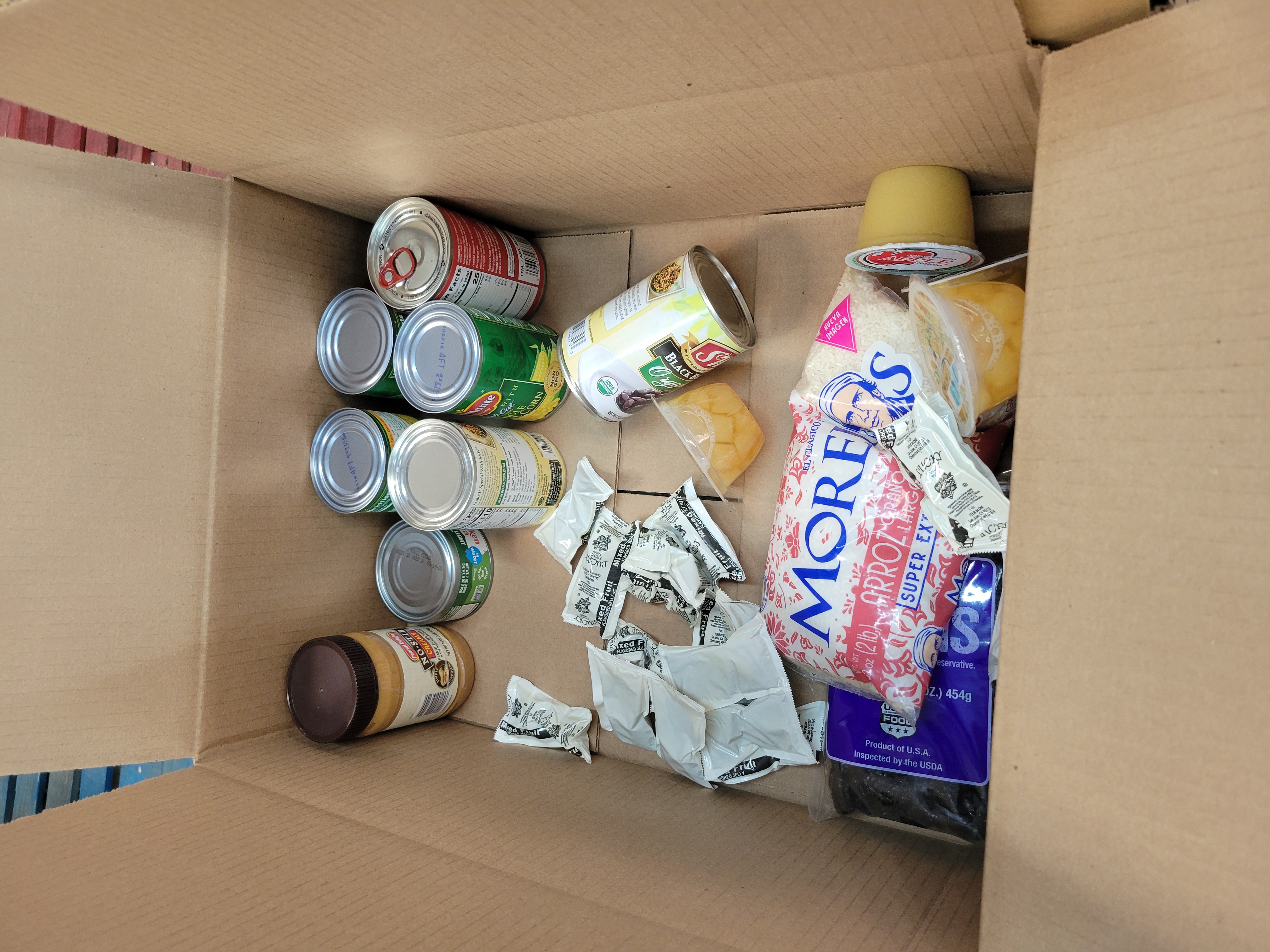 Dry goods filled cardboard box.