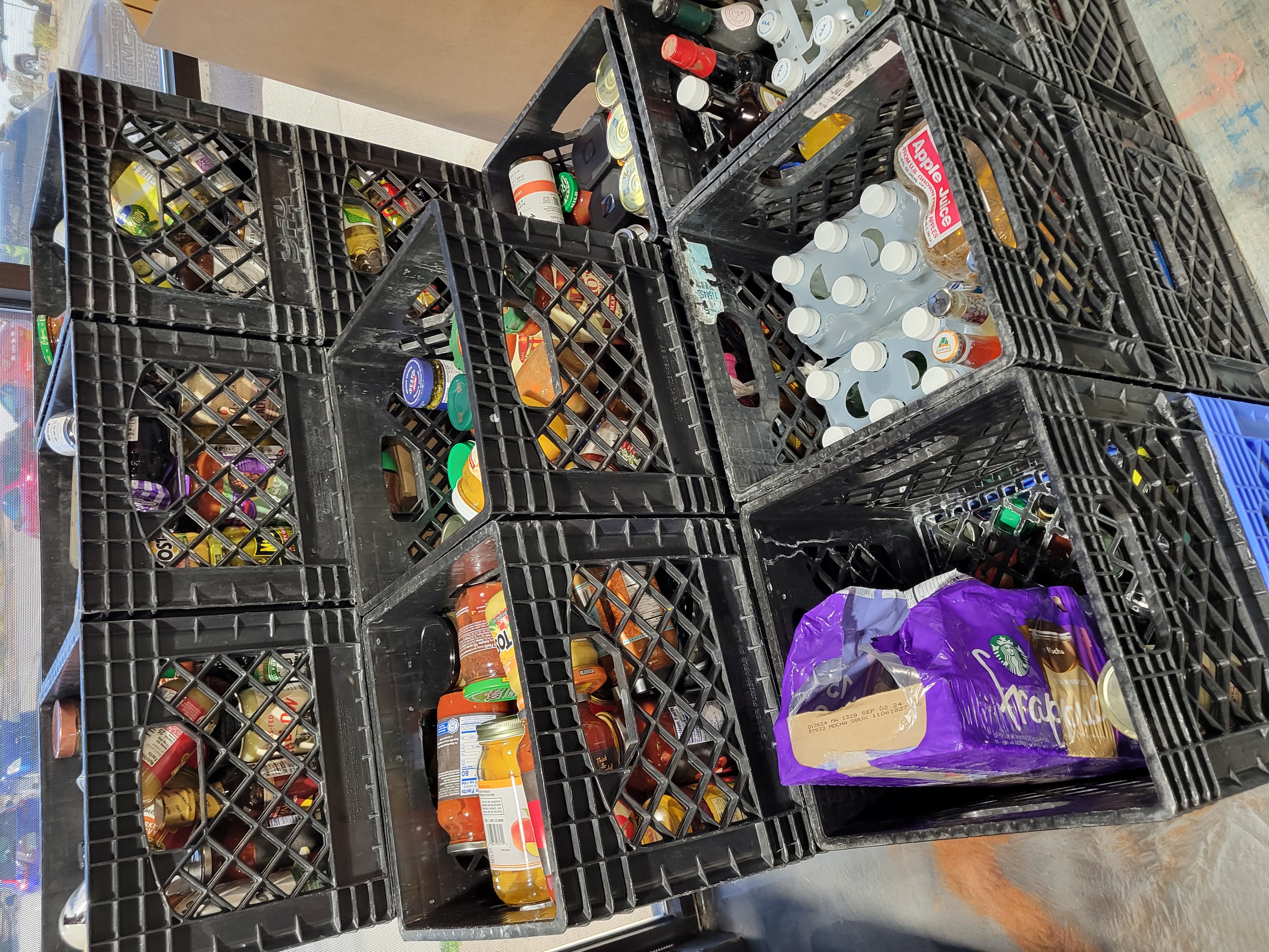 Glass jars in crates.
