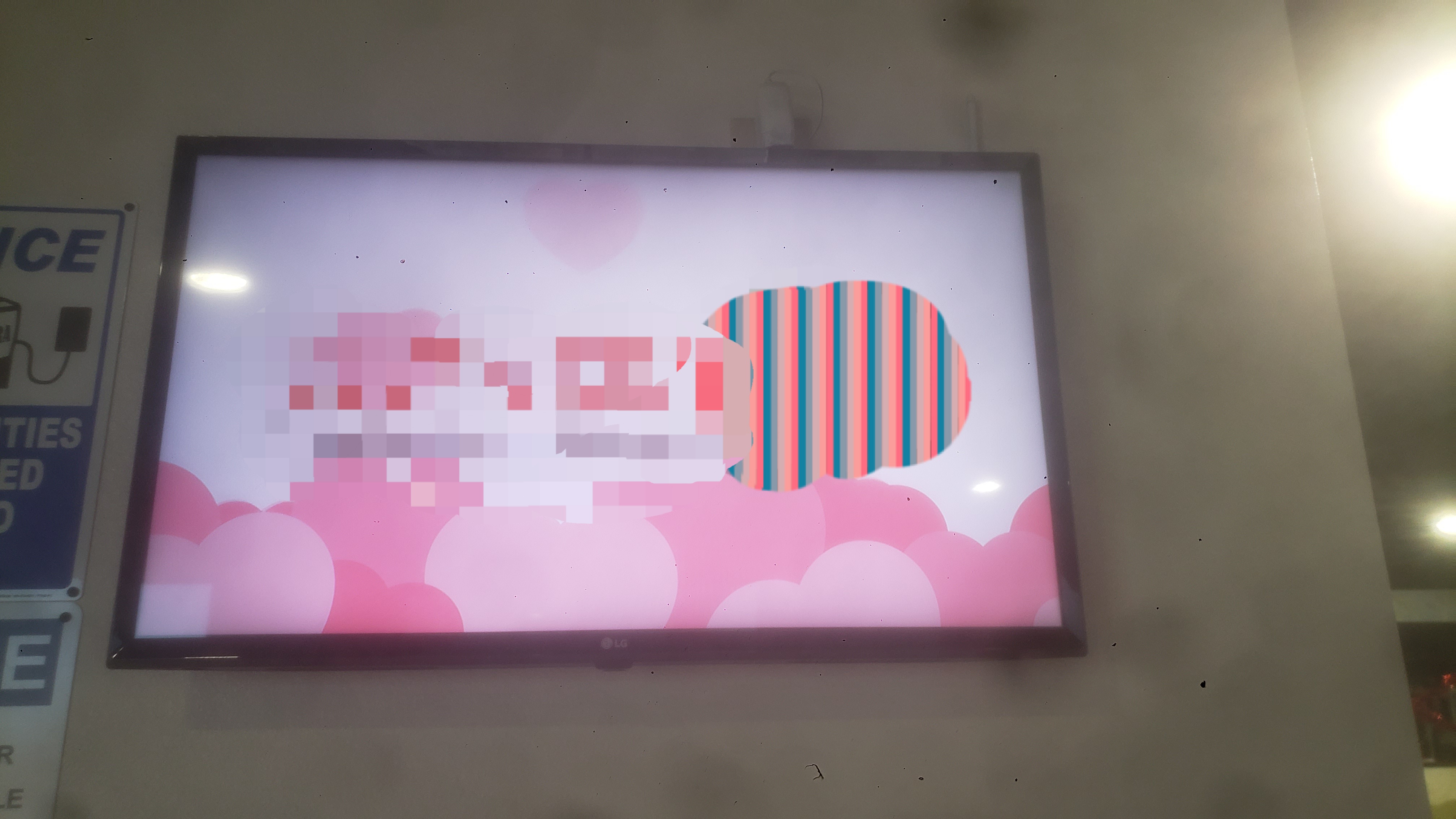 Food bank logo with floating hearts on a tv.