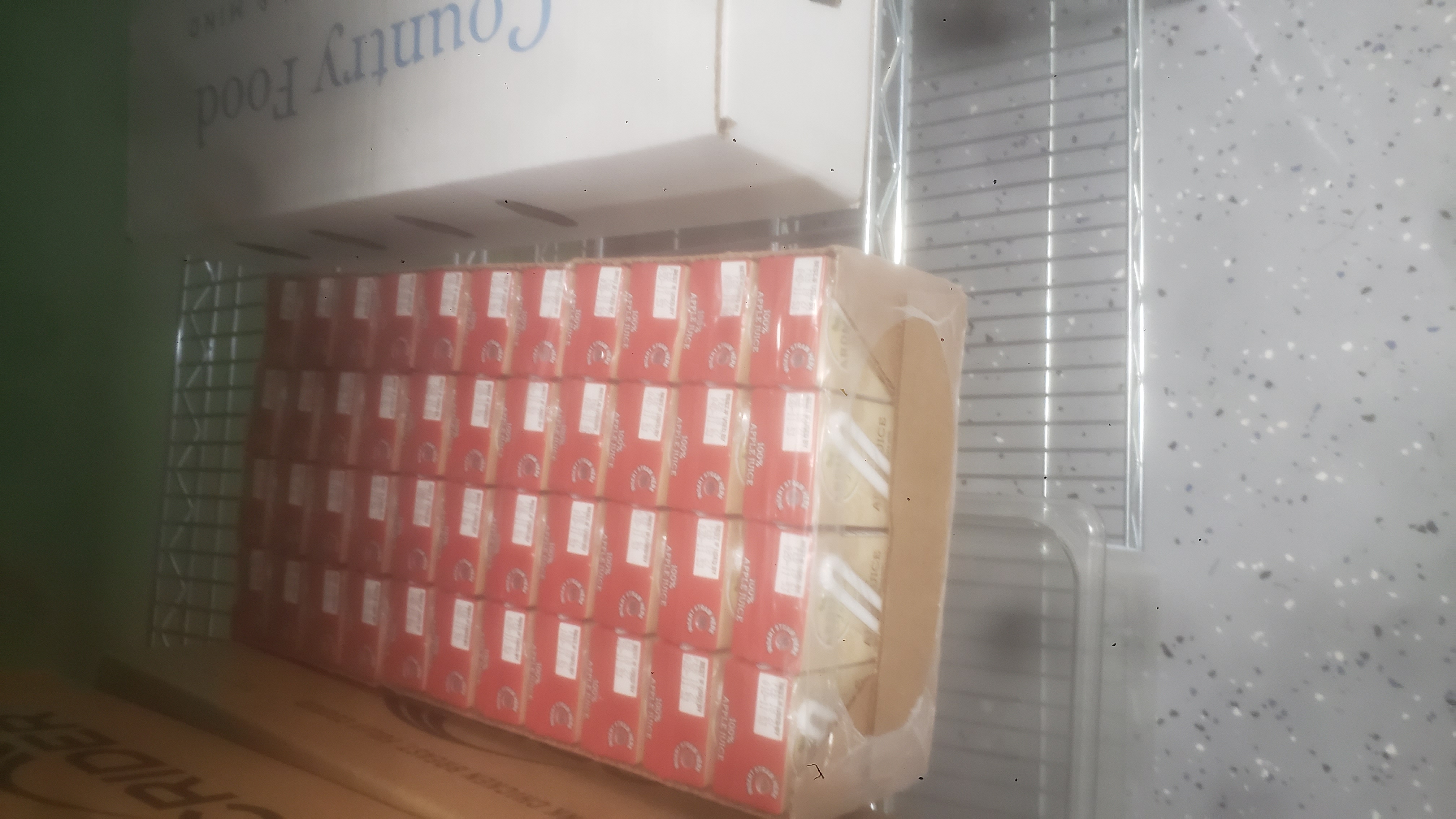 Case of apple juice boxes.