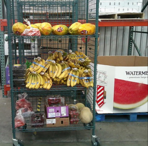 Produce on a cage shelf.