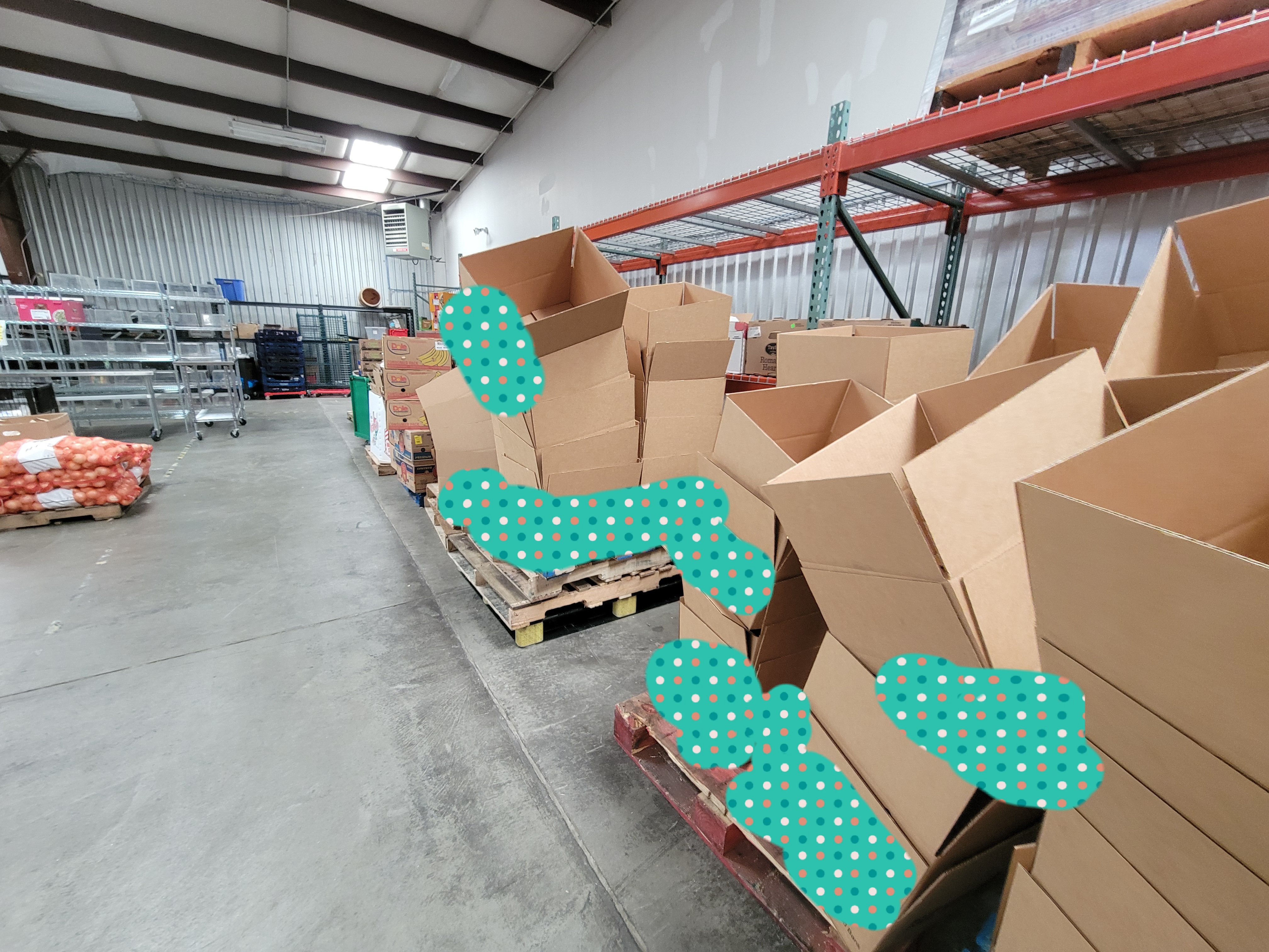 Stacks of cardboard boxes on pallets.